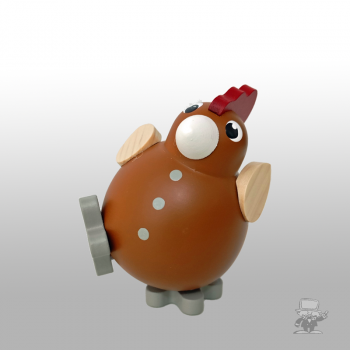 Küken Flora auf einem Bein