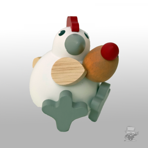 Küken Hanna sitzend mit Babyküken